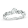0.33 CT. T.W. Diamond Twist Shank Engagement Ring in 10K White Gold