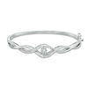 Thumbnail Image 1 of Unstoppable Love™ 0.37 CT. T.W. Diamond Bypass Twist Bangle in 10K White Gold