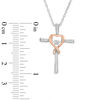Unstoppable Love™ 0.12 CT. T.W. Diamond Heart Wrapped Cross Pendant in 10K Two-Tone Gold