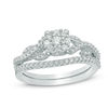 0.50 CT. T.W. Diamond Frame Vine Split Shank Bridal Set in 10K White Gold