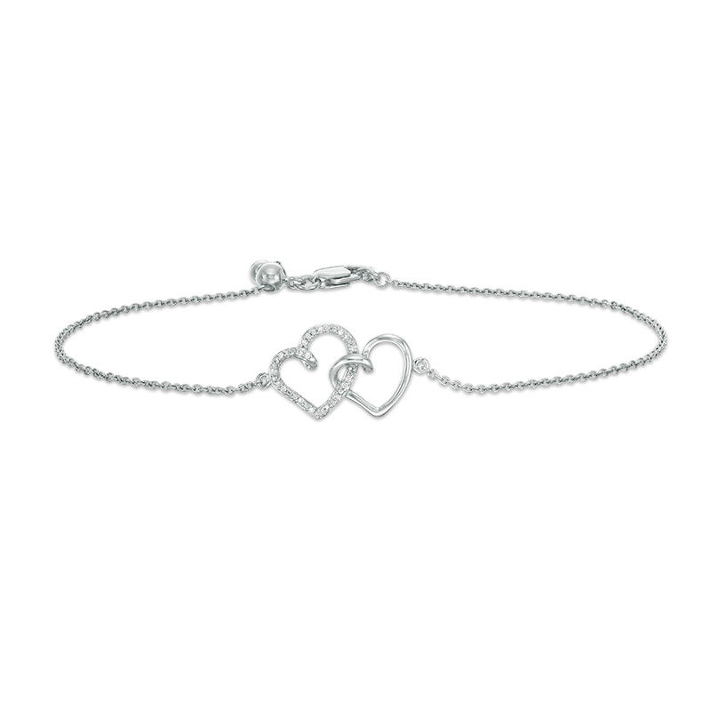 0.04 CT. T.W. Diamond Interlocking Hearts Bracelet in Sterling Silver - 6.75"|Peoples Jewellers