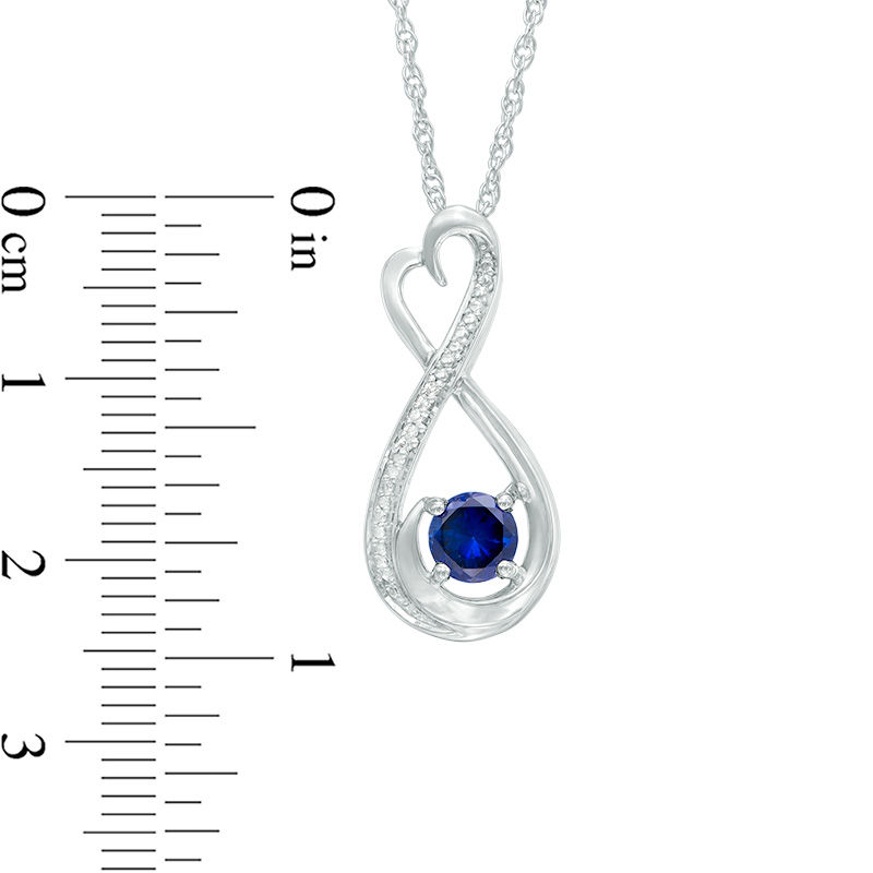 5.0mm Lab-Created Blue Sapphire and Diamond Accent Heart-Shaped Infinity Pendant in Sterling Silver