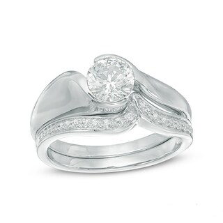 0.87 CT. T.W. Certified Canadian Diamond Swirl Bypass Bridal Set in 14K White Gold (I/I1)