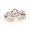 Thumbnail Image 0 of 0.45 CT. T.W. Diamond Bypass Frame Twist Bridal Set in 10K Rose Gold
