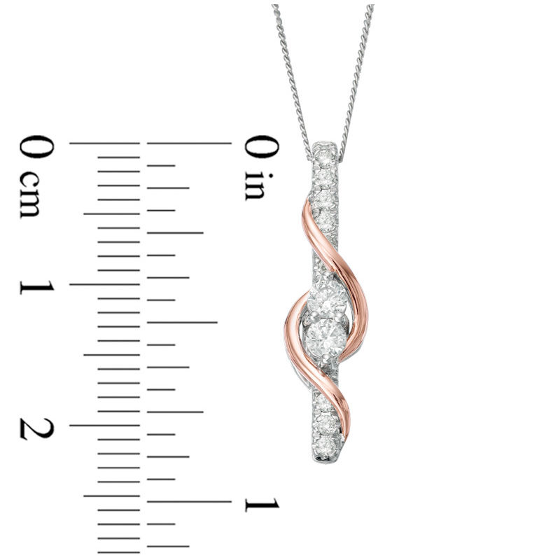 Peoples Jewellers Ever Us 0.50 CT.T.W. Two Stone Diamond Linear Swirl Pendant in 14K Two Tone Gold 19 Upper Canada Mall