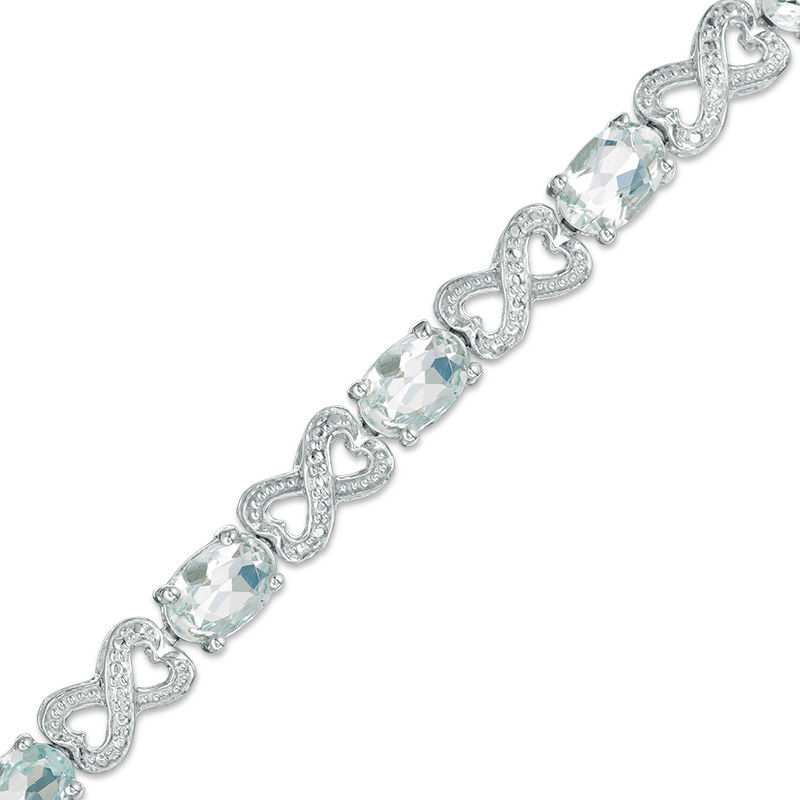 Oval Aquamarine and Diamond Accent Heart-Shaped Infinity Bracelet in Sterling Silver - 7.25"