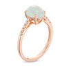 Thumbnail Image 1 of Oval Aquamarine Cabochon and Diamond Accent Ring in 10K Rose Gold