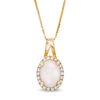 Thumbnail Image 0 of Oval Opal and 0.09 CT. T.W. Diamond Frame Pendant in 10K Gold