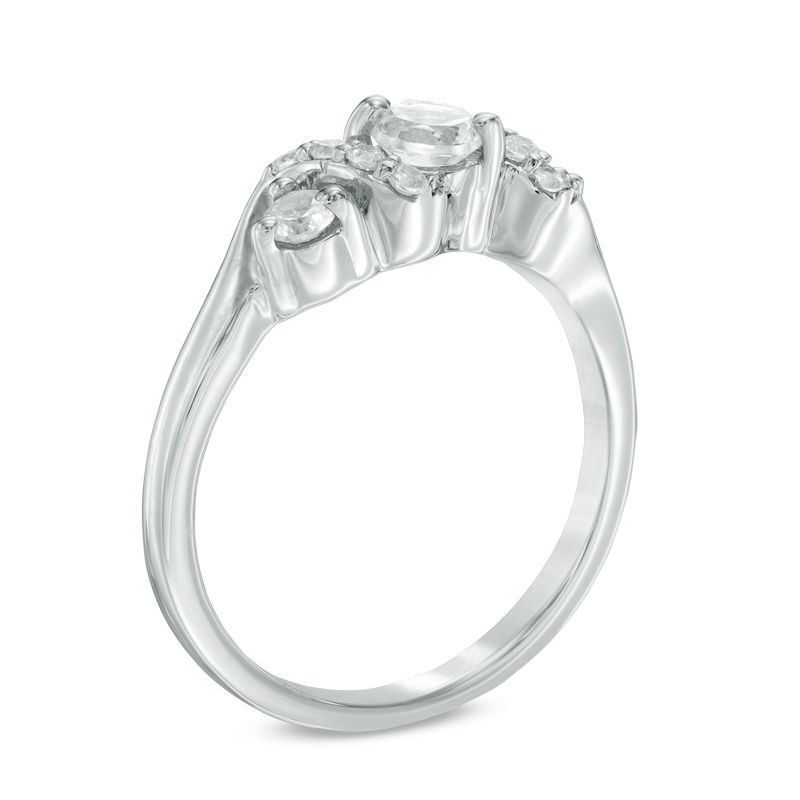4.0mm Lab-Created White Sapphire and 0.11 CT. T.W. Diamond Overlay Three Stone Ring in Sterling Silver