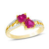 Thumbnail Image 0 of 5.0mm Heart-Shaped Lab-Created Ruby and Diamond Accent Mirrored Split Shank Scroll Ring in 10K Gold