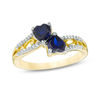 Thumbnail Image 0 of 5.0mm Heart-Shaped Lab-Created Blue Sapphire and Diamond Accent Mirrored Split Shank Scroll Ring in 10K Gold