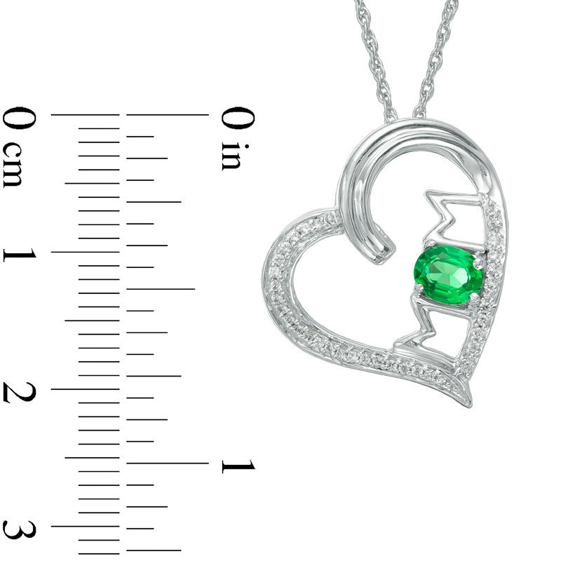 Oval Lab-Created Emerald and 0.09 CT. T.W. Diamond Tilted Heart with "MOM" Pendant in Sterling Silver