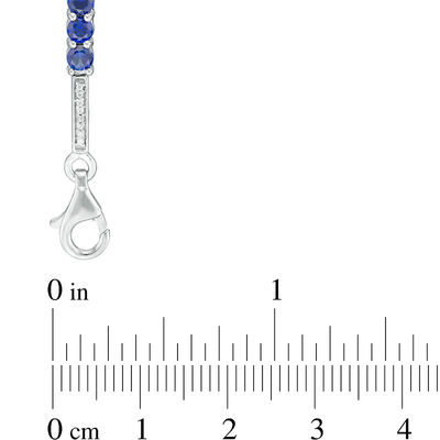 3.5mm Lab-Created Blue Sapphire and 0.18 CT. T.W. Diamond Three Stone Station Bracelet in Sterling Silver - 7.5"