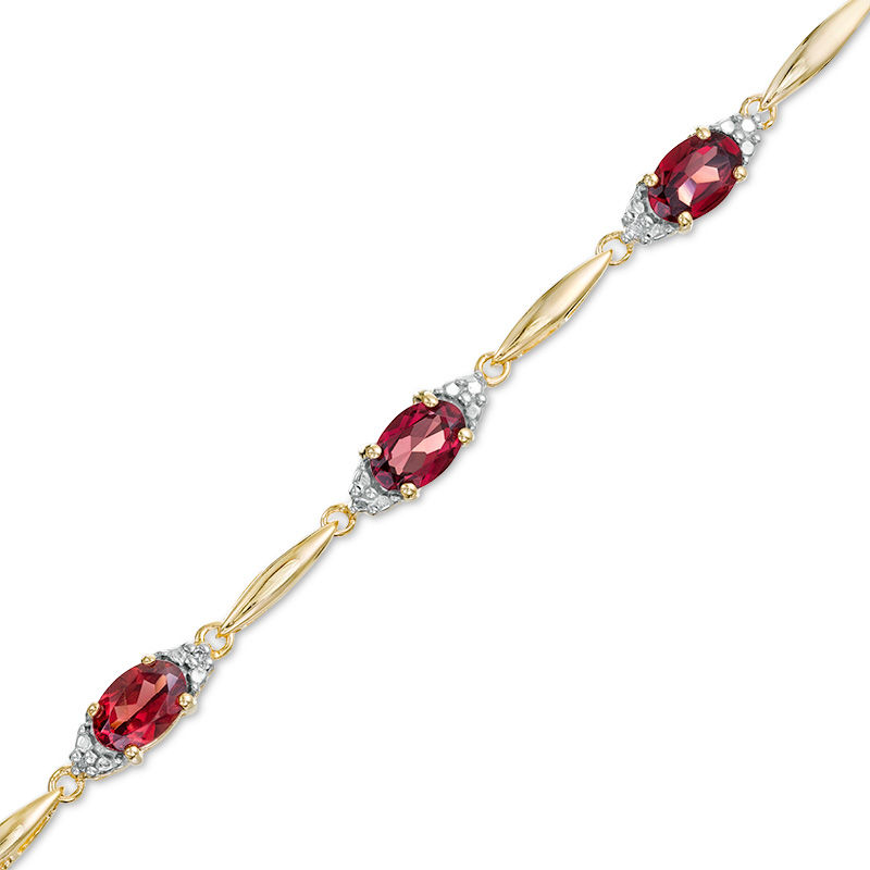 Main Image 1 of Oval Garnet and Diamond Accent Bracelet in Sterling Silver with 10K Gold Plate - 7.25"
