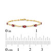 Thumbnail Image 4 of Oval Garnet and Diamond Accent Bracelet in Sterling Silver with 10K Gold Plate - 7.25"