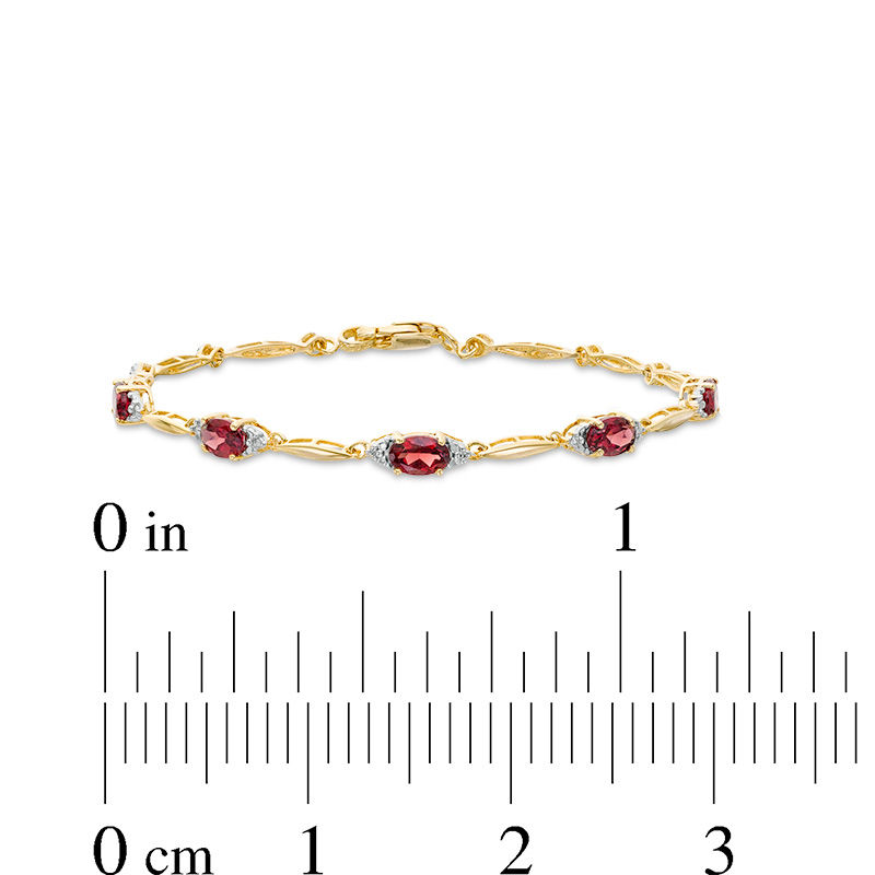 Oval Garnet and Diamond Accent Bracelet in Sterling Silver with 10K Gold Plate - 7.25"