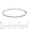 Thumbnail Image 1 of Alternating Lab-Created Blue and White Sapphire Bangle in Sterling Silver