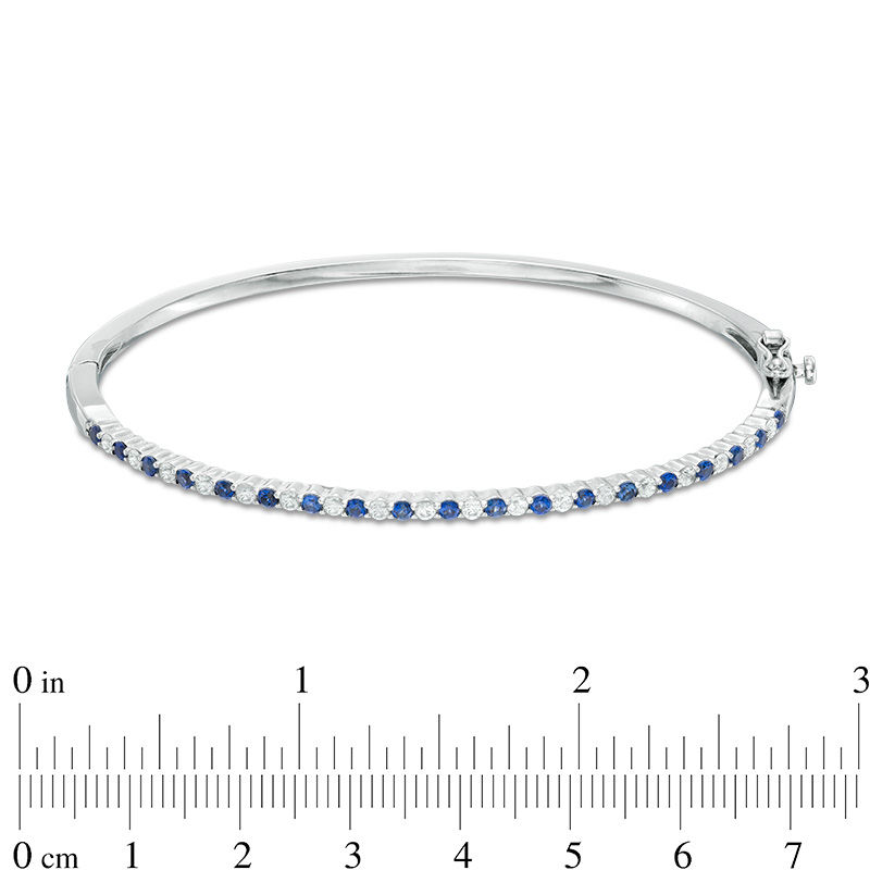 Main Image 2 of Alternating Lab-Created Blue and White Sapphire Bangle in Sterling Silver