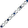 Thumbnail Image 0 of Vera Wang Love Collection 0.58 CT. T.W. Diamond and Blue Sapphire Infinity Bracelet in Sterling Silver - 7.5"