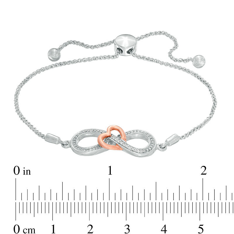 Diamond Accent Infinity and Heart Bolo Bracelet in Sterling Silver and 10K Rose Gold - 9.5"|Peoples Jewellers