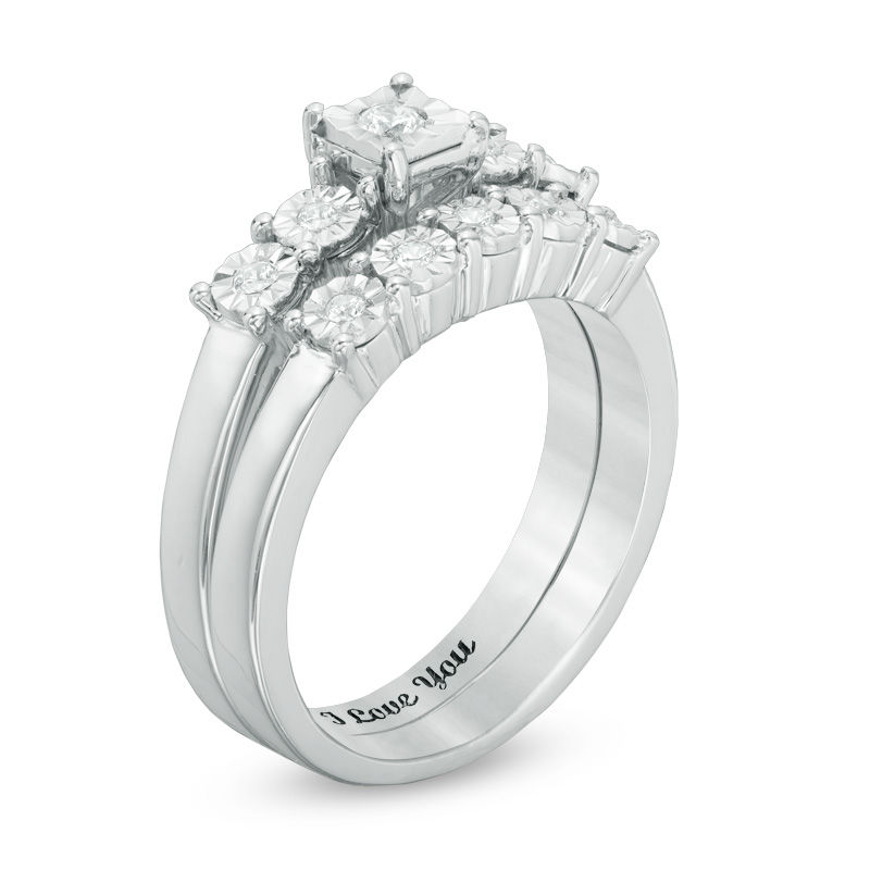 1/8 CT. T.W. Diamond Five Stone Bridal Set in Sterling Silver (1 Line)
