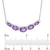 Oval Amethyst and 0.09 CT. T.W. Diamond Graduated Five Stone Necklace in Sterling Silver