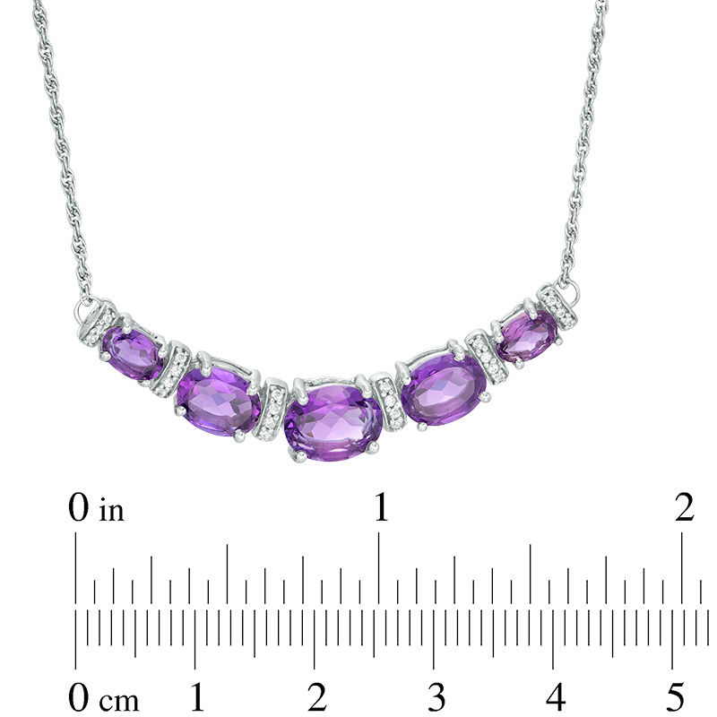 Oval Amethyst and 0.09 CT. T.W. Diamond Graduated Five Stone Necklace in Sterling Silver