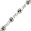 Thumbnail Image 1 of Oval Smoky Quartz and 0.15 CT. T.W. Diamond Frame Twist Station Bracelet in Sterling Silver - 7.5"
