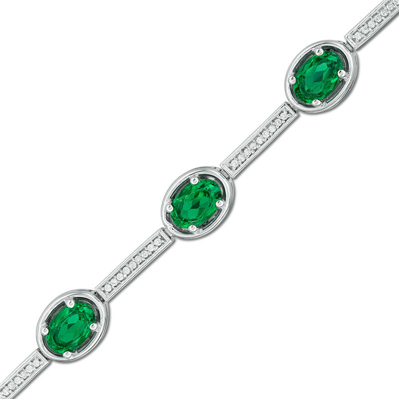 Oval Lab-Created Emerald and 0.23 CT. T.W. Diamond Station Bracelet in Sterling Silver - 7.5"|Peoples Jewellers