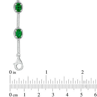 Oval Lab-Created Emerald and 0.23 CT. T.W. Diamond Station Bracelet in Sterling Silver - 7.5"