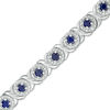 Thumbnail Image 0 of Lab-Created Blue Sapphire and 0.18 CT. T.W. Diamond Bracelet in Sterling Silver - 7.25"