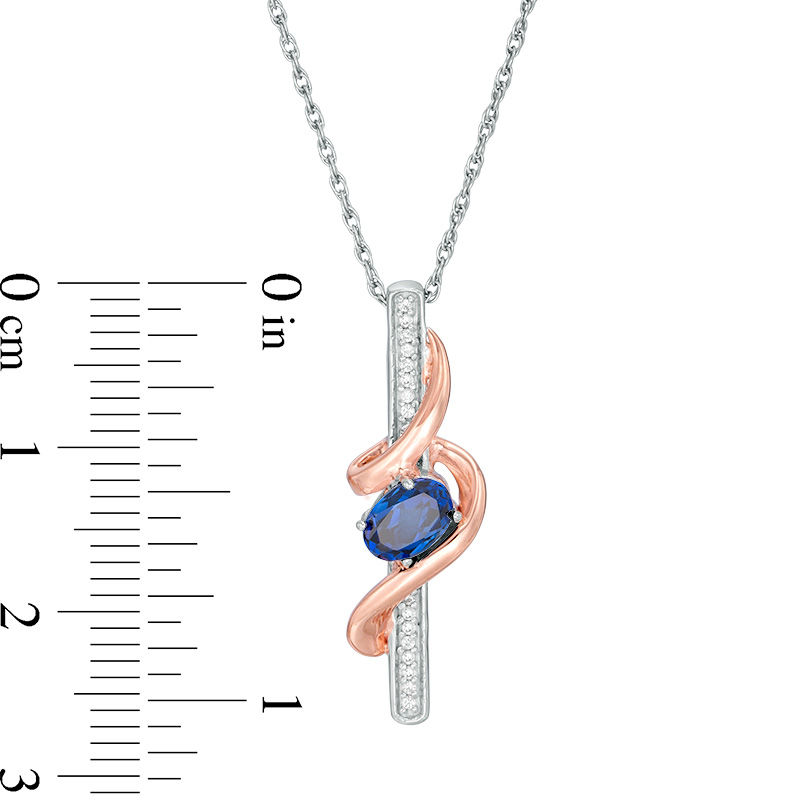 Oval Lab-Created Blue Sapphire and Diamond Accent Linear Swirl Pendant in Sterling Silver and 10K Rose Gold