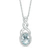 Oval Aquamarine and Diamond Accent Frame Twist Pendant in Sterling Silver