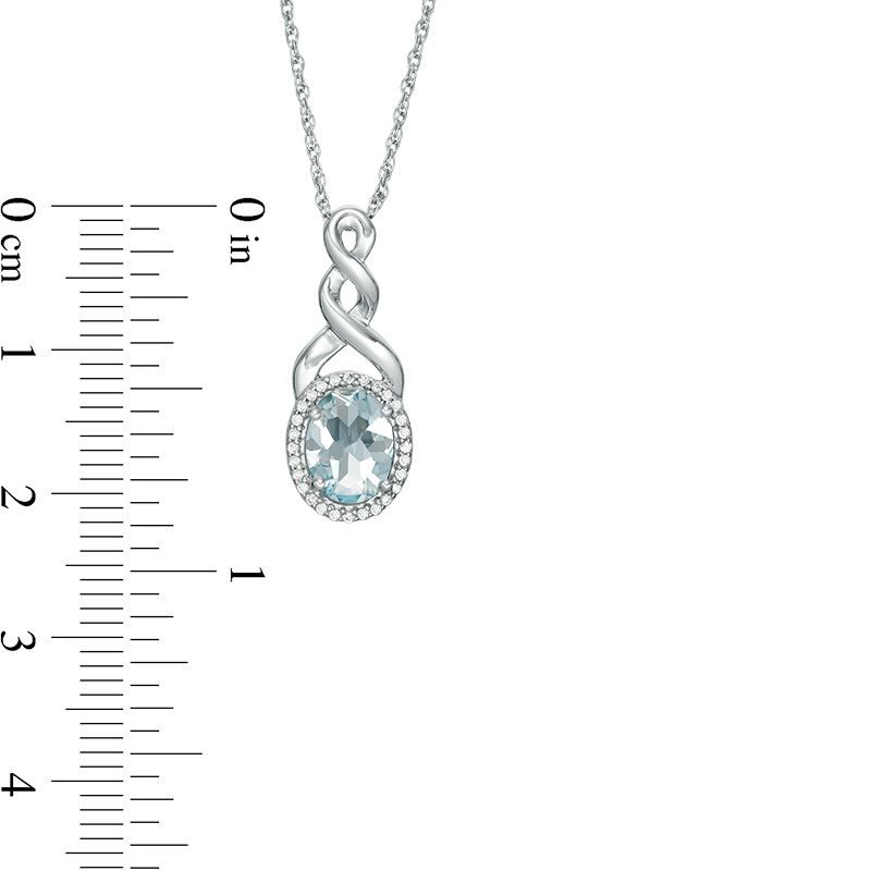 Oval Aquamarine and Diamond Accent Frame Twist Pendant in Sterling Silver