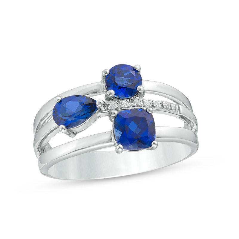 Multi-Shaped Lab-Created Blue Sapphire and Diamond Accent Three Stone Orbit Ring in Sterling Silver