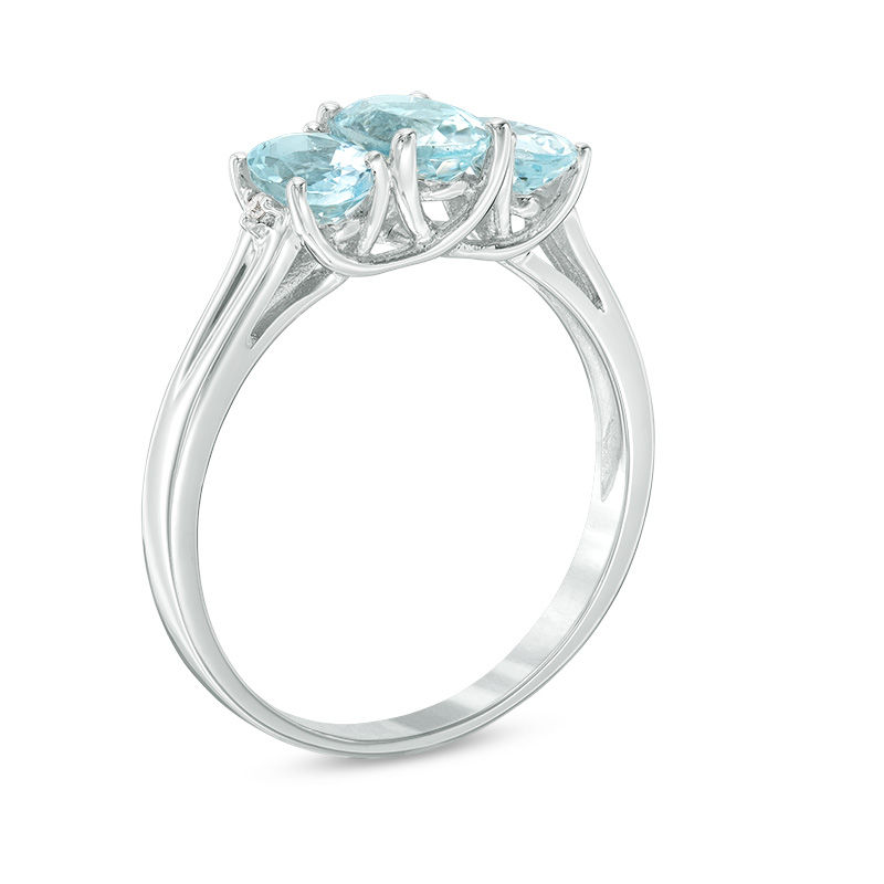 Oval Aquamarine and Diamond Accent Three Stone Ring in 10K White Gold