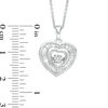 Thumbnail Image 1 of Unstoppable Love™ 0.33 CT. T.W. Baguette and Round Diamond Heart Pendant in 10K White Gold