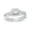 Thumbnail Image 1 of 0.88 CT. T.W. Certified Canadian Diamond Twist Bridal Set in Platinum (H/VS2)