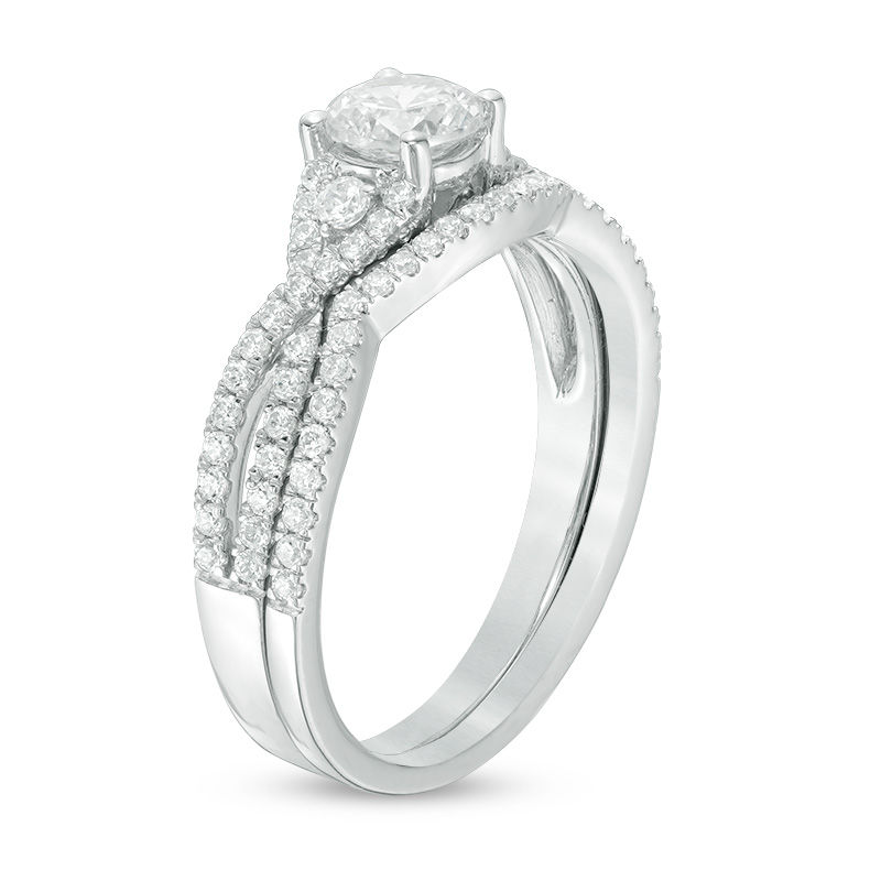 Main Image 2 of 0.88 CT. T.W. Certified Canadian Diamond Twist Bridal Set in Platinum (H/VS2)