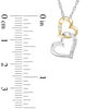 0.05 CT. T.W. Diamond Interlocking Hearts Pendant in 10K Two-Tone Gold