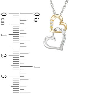 0.05 CT. T.W. Diamond Interlocking Hearts Pendant in 10K Two-Tone Gold