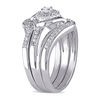 Thumbnail Image 1 of 0.32 CT. T.W. Diamond Twist Bypass Three Piece Bridal Set in Sterling Silver