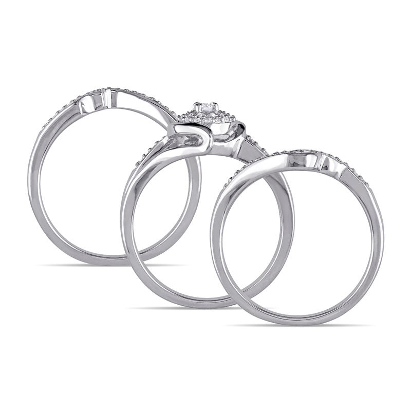0.32 CT. T.W. Diamond Twist Bypass Three Piece Bridal Set in Sterling Silver