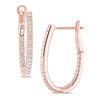 Thumbnail Image 0 of 0.25 CT. T.W. Diamond Inside-Out Oval Hoop Earrings in 14K Rose Gold