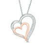 0.09 CT. T.W. Diamond Tilted Double Heart Pendant in Sterling Silver and 10K Rose Gold
