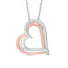 0.11 CT. T.W. Diamond Tilted Overlay Double Heart Pendant in Sterling Silver and 10K Rose Gold