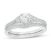Thumbnail Image 1 of Lab-Created White Sapphire and 0.11 CT. T.W. Diamond Tri-Sides Bridal Set in Sterling Silver
