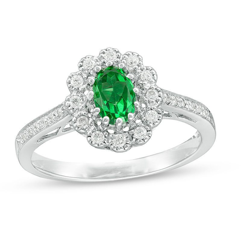 Oval Lab-Created Emerald and 0.15 CT. T.W. Diamond Flower Frame Engagement Ring in Sterling Silver