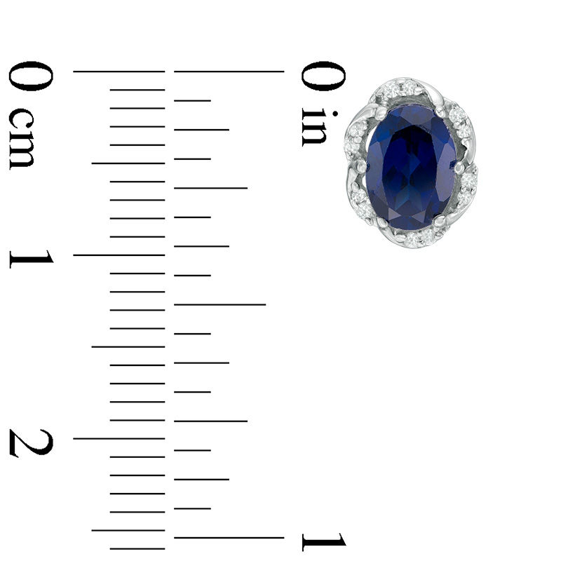 Main Image 2 of Oval Lab-Created Blue Sapphire and 0.09 CT. T.W. Diamond Frame Stud Earrings in Sterling Silver