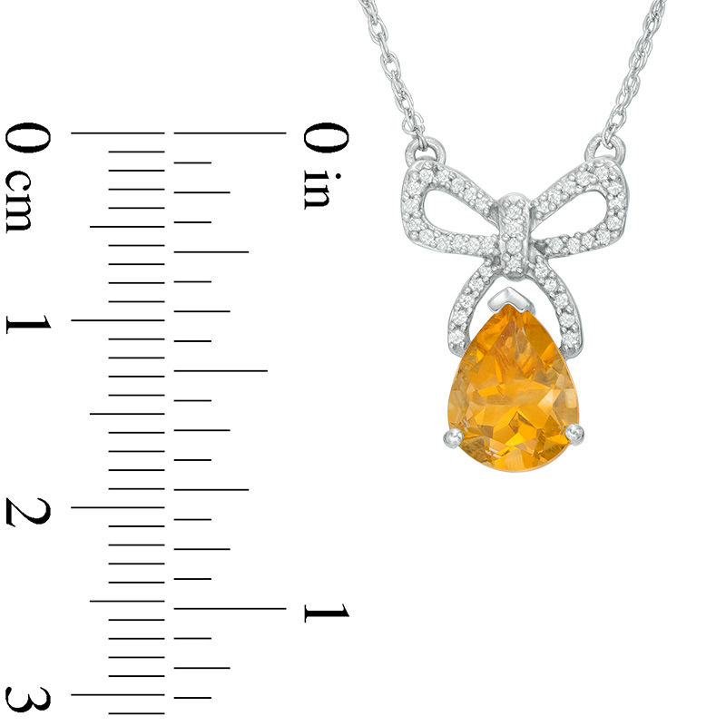 Pear-Shaped Citrine and 0.09 CT. T.W. Diamond Bow Necklace in Sterling Silver
